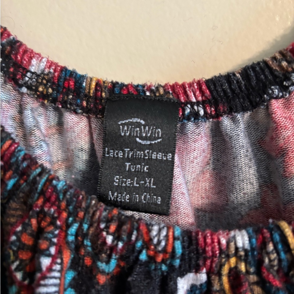 Win/Win tunic top, crocheted trim on the sleeves . Size L/XL